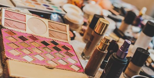 various makeup laid out on a table